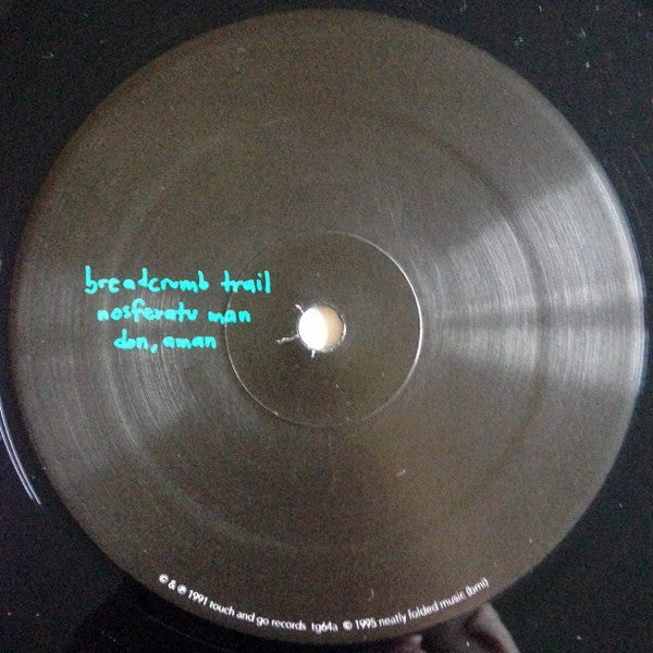 Image of Label Cover of LP - NEW/NEW - SLINT, Spiderland (Touch & Go; TG064LP, US 2023 Reissue), , A classic album from 1991 that still defines post rock, and has never been bettered. Although this Kentucky combo had a short lifespan, its influence has been extraordinary, presaging the underground 'math-rock' revolution and spawning spinoffs such as the For Carnation and King Kong with members playing with Palace Brothers, Tortoise and a multitude more. But don't go thinking that the foursome is a mere foot