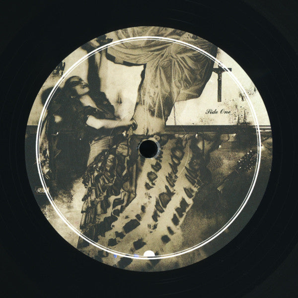 Image of Label Cover of LP - NEW/NEW - PIXIES, Surfer Rosa (4AD; CAD803, US 2000s Reissue, Inner), , This album epitomises everything that is the Pixies. Every aspect of this album is close to perfection. Produced by Steve Albini, it captures the raw essence of Pixies in full flight. Black Francis' primal wail is complemented by the sheer brilliance of Joey Santiago on guitar, which in turn is pulled together by the rhythm unit of Kim Deal and David Lovering. The Pixies are without doubt one of the most imp