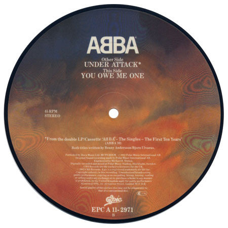 Image of Back Cover of 7" - VG+/VG+ - ABBA, Under Attack / You Owe Me One (Epic; EPC A 11-2971, UK 1982, Clear Plastic Sleeve, Picture Disc), Strong VG+, Sleeve Creased, - 0926398E