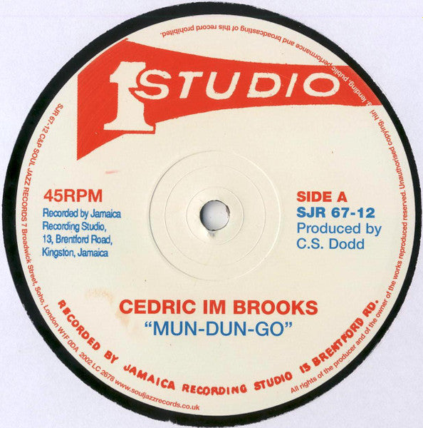 Image of Label Cover of 0316356C: 12" - CEDRIC IM BROOKS / SOUND DIMENSION, Mun-Dun-Go / Heavy Rock (Soul Jazz; SJR 67-12, UK 2002, Company Sleeve) Lighter marks / scuffs only on record. Sleeve worn with split at corner, creasing and stains G+/G+