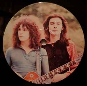 Image of Label Cover of LP - NEW/NEW - T. REX, Electric Warrior (A&M; 5354076, Europe 2014 Reissue, Inner), , The 'Electric Warrior' album (1971) effectively buried the psychedelic folk rock of Tyrannosaurus Rex and immortalized the trashy hard rock of tT rRex. One successful single (Ride A White Swan') and eponymous album had already introduced the T. Rex name in 1970, and the single 'Hot Love' first boasted the expanded band line-up of Bolan, Mickey Finn, Steve Currie and bill legend. but 'Electric Warrio