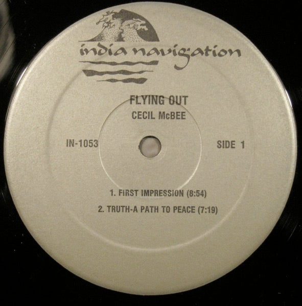 Image of Label Cover of 2314316C: LP - CECIL MCBEE, Flying Out (India Navigation; IN 1053, US 1982) Cut-out (Corner cut). Light ring wear and some creasing to sleeve. Disc is glossy with only the lightest of marks.  VG/VG+