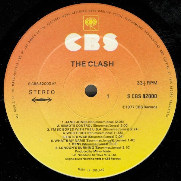 Image of Label Cover of 4444132S: LP - THE CLASH, The Clash (CBS; CBS 82000, UK 1970s Reissue, Repress. Nineden/Riva Publishing Credits, No Label Code, Arrow Under Stereo.) Light wear on sleeve. Audible spot on A5 where there's a bit of dirt caught in the grooves.   VG/VG