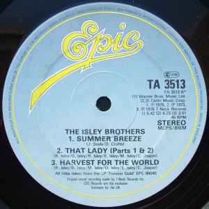 Image of Back Cover of 12" - G/G+ - THE ISLEY BROTHERS, Between The Sheets (Epic; TA 3513, UK 1983, Company Sleeve), Sleeve has corner ripped, wear, creasing, scuffs and an old sticker, A1 - Between The SheetsA2 - Between The Sheets (Instrumental)B1 - Summer BreezeB2 - That Lady (Parts 1 & 2)B3 - Harvest For The World - 2216430C