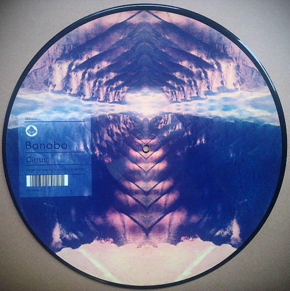 Image of Back Cover of 3224069E: 12" - BONOBO, Cirrus (Ninja Tune; ZEN12357, UK 2013, Clear Plastic Gatefold Sleeve With Card Inner, Art Print, Zoetrope Viewer, Picture Disc, Single Sided, Limited Edition, 500 copies came with a numbered art print.) No. 274/500  VG+/VG+