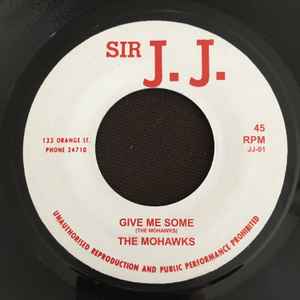 Image of Back Cover of 7" - /VG - THE MOHAWKS, The Champ / Give Me Some (Sir J. J.; JJ-01, UK 2004 Reissue), Light brush marks.,  - 3626205E