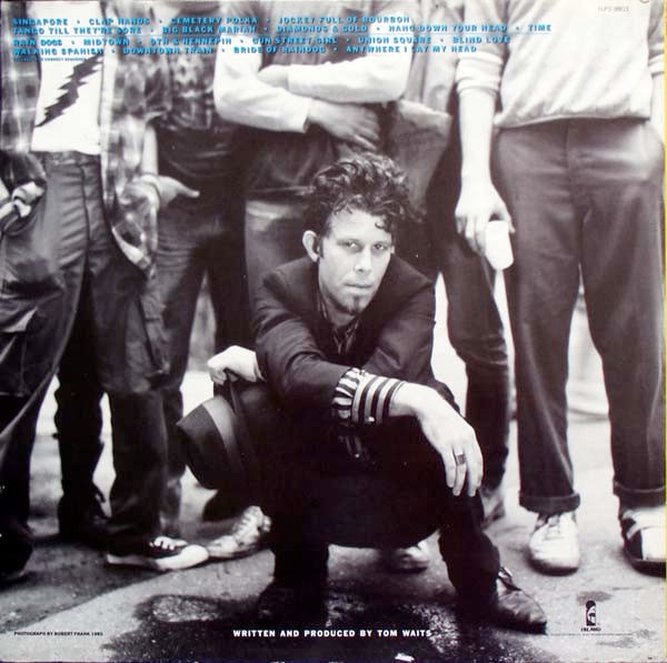 Image of Back Cover of LP - VG/VG+ - TOM WAITS, Rain Dogs (Island White Colourband; ILPS 9803, UK 1985, Inner, Sound Clinic Matrix), tear in artwork on lower back cover, light edge wear, seam split on Inner,  - 3946005S
