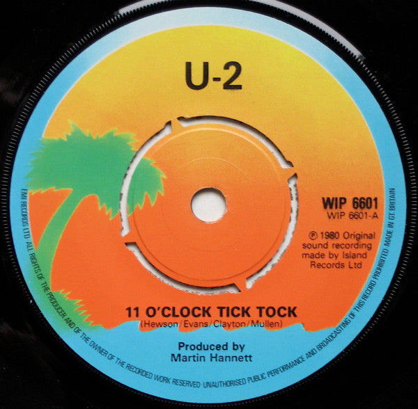 Image of Label Cover of 1124267E: 7" - U2, 11 O'Clock Tick Tock / Touch (Island; WIP6601, UK 1980, Picture Sleeve, Push Out Centre, U-2 Band Name on Label) Water Damage To Sleeve, Ring Wear And Other Wear To Sleeve  G+/VG+