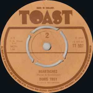 Image of Back Cover of 3354076S: 7" - DORIS TROY, I'll Do Anything / Heartaches (Toast; TT 507, UK 1968 Reissue, Plain Sleeve, 4 prong centre) Light marks.  /VG