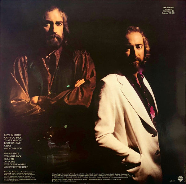 Image of Back Cover of LP - VG/G+ - FLEETWOOD MAC, Mirage (Warner Bros; K56952, Germany 1980s Reissue, Inner), Edge wear. Inner has a creased corner. Unfeelable marks on disc.,  - 3546167S