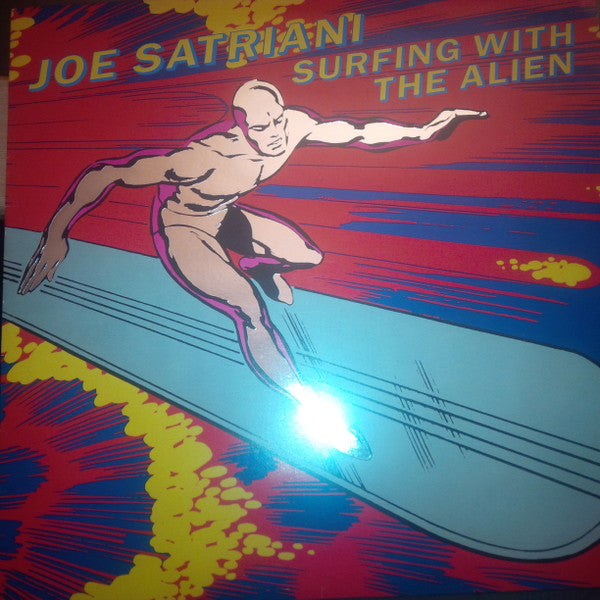Image of Front Cover of LP - VG/G+ - JOE SATRIANI, Surfing With The Alien (Food For Thought Records; GRUB 8, UK 1987, Embossed Sleeve, Inner, Silver Surfer is silver!), Slightly dished. ,  - 3126009E