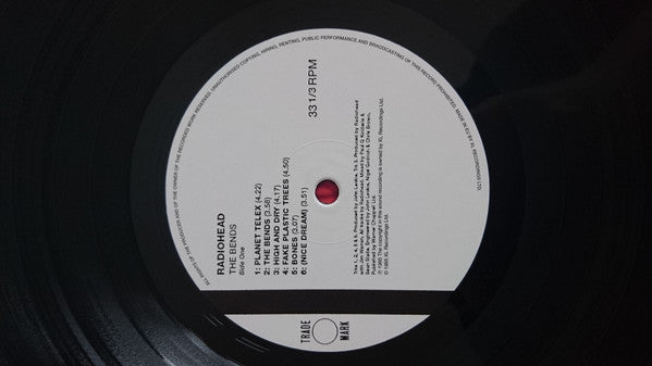 Image of Label Cover of LP - NEW/NEW - RADIOHEAD, The Bends (XL Recordings; XLLP780, Europe 2016 Reissue, Inner), , 'The Bends' is one of the most essential albums of the 1990s, and a spectacular indicator of further greatness to come.  'High And Dry', 'Just', 'Street Spirit', 'Fake Plastic Trees': nary a pop song among them, yet it's testament to their greatness that they all were hit singles. It's obvious that the five Oxford-based boys had matured immensely since the release of their debut. - 1156009S