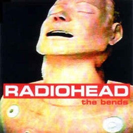 Image of Front Cover of LP - NEW/NEW - RADIOHEAD, The Bends (XL Recordings; XLLP780, Europe 2016 Reissue, Inner), , 'The Bends' is one of the most essential albums of the 1990s, and a spectacular indicator of further greatness to come.  'High And Dry', 'Just', 'Street Spirit', 'Fake Plastic Trees': nary a pop song among them, yet it's testament to their greatness that they all were hit singles. It's obvious that the five Oxford-based boys had matured immensely since the release of their debut. - 1156009S