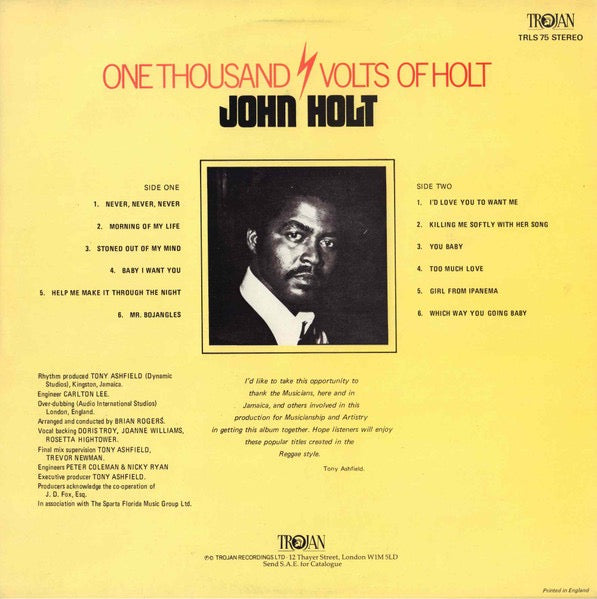 Image of Back Cover of LP - G+/VG - JOHN  HOLT  , 1000 Volts Of Holt (Trojan Records ; TRLS 75, UK 1980s Reissue), Spine wear on sleeve, stain on back. Lots of light marks on disc, plays strong VG or better.,  - 2426170E