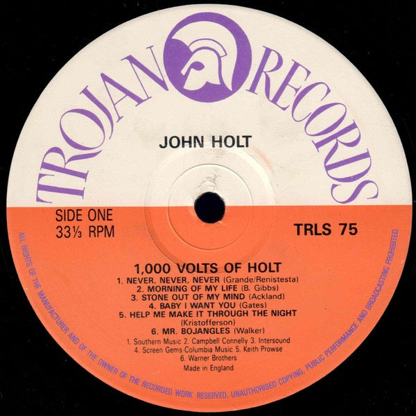 Image of Label Cover of LP - G+/VG - JOHN  HOLT  , 1000 Volts Of Holt (Trojan Records ; TRLS 75, UK 1980s Reissue), Spine wear on sleeve, stain on back. Lots of light marks on disc, plays strong VG or better.,  - 2426170E