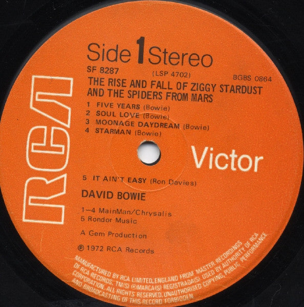 Image of Label Cover of LP - G+/G+ - DAVID BOWIE, The Rise And Fall Of Ziggy Stardust And The Spiders From Mars (RCA Victor Orange; SF 8287, UK 1972, Gem Production, No Mainman on Rear Sleeve, Mainman/Chrysalis Publishing on Label, Inner, Not Dynaflex, Matrix -1E/2E. Mainman credit on label NOT sleeve), Many light hairlines. Edgewear - sleeve taped at top and bottom.,  - 2626124E