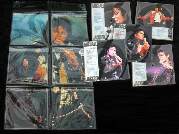 Image of Label Cover of 5x7" - VG/G+ - MICHAEL JACKSON, Souvenir Singles Pack (Epic; MJ 5, UK 1988, 6 Panel Printed PVC Hanger, Booklet, All Five Square Picture Discs), Has been in storage so has edge warp/fogging issues in places. PVC hanger is intact with just a couple of small splits, displays nicely.,  - 4316644C