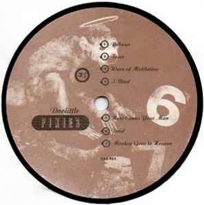 Image of Label Cover of LP - G+/F - PIXIES, Doolittle (4AD; CAD 905, UK 1989, Textured Sleeve, Inner), Disc covered in light marks and hairlines, Visually fair but plays above grade with some surface noise in quiet sections, Sleeve a bit worn with edge wear. ,  - 2716378C