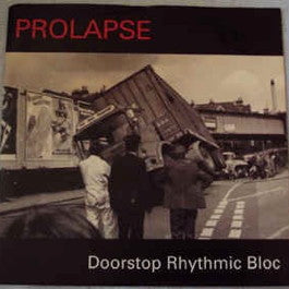Image of Front Cover of 7" - VG/VG - PROLAPSE, Doorstop Rhymthmic Bloc / Pile Tent / Muscovite Song (Cherry Red; cherry 135, UK 1994, Picture Sleeve), Strong VG,  - 3456174S
