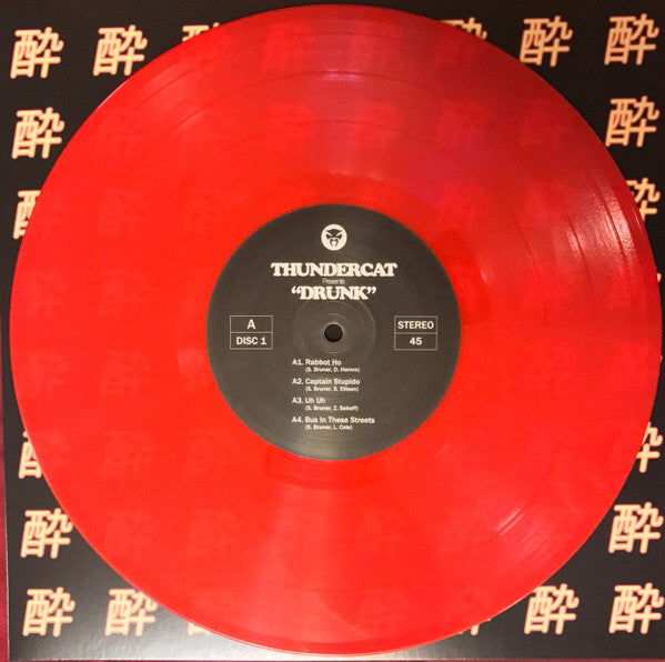 Image of Label Cover of 4x10" LP - NEW/NEW - THUNDERCAT, Drunk (Brainfeeder; BF064 , UK 2017, Box Set, Red Vinyl), , If you move in certain areas of music (the LA Brainfeeder / cosmic jazz axis and surrounds), you will appreciate Thundercat as a god-like figure. The man plays electric bass like nobody s business, but he is also a mighty songwriter, and Drunk is his own record. It features an amazing cast of collaborators (Kendrick Lamar! Kamasi Washington! Michael McDonald!), and is presented on one CD or f