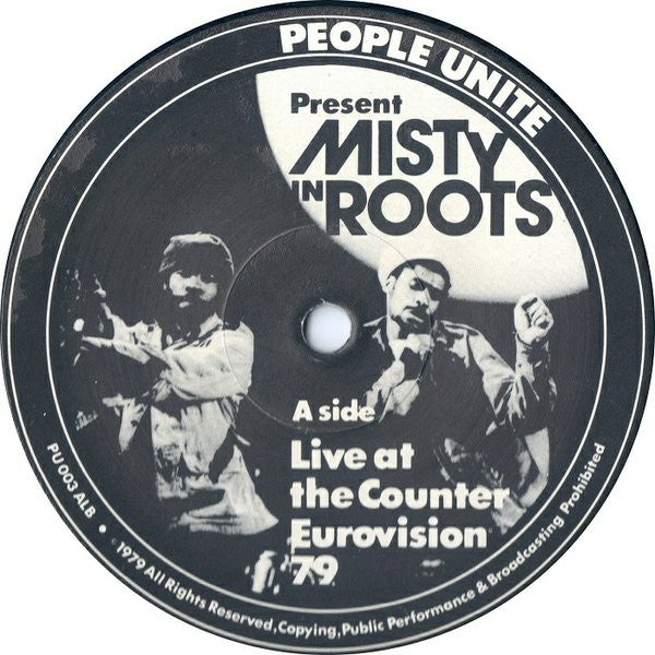 Image of Label Cover of LP - VG/G+ - MISTY IN ROOTS, Live At The Counter Eurovision 79 (People Unite; PU 003 ALB, UK 1979), Wavy sleeve with a few stains. Disc has some storage marks in run ins.,  - 3816035C