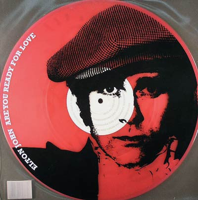 Image of Back Cover of 12" - VG+/VG+ - ELTON  JOHN, Are You Ready For Love (Southern Fried Records ; ECB50LOVE , UK 2003, Printed Clear Plastic Sleeve, Limited to 5000 copies on Transparent Pink Vinyl. The plastic sleeve features artwork by Keith Haring.), Light fogging,  - 1546262S