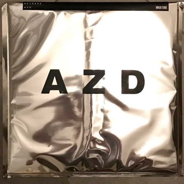 Image of Front Cover of 2xLP - VG/VG+ - ACTRESS, AZD (Ninja Tune; ZEN241X, UK 2017, Chrome Silver Bag, 2 Inners, Limited to 500 Copies, Clear Vinyl), Light creasing to outer foil, sleeve inside & inners are VG+.,  - 3926303E