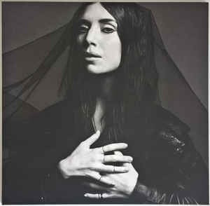 Image of Front Cover of LP - VG+/VG+ - LYKKE LI, I Never Learn (Atlantic; 825646306039, UK 2014, Textured Gatefold Sleeve, Booklet), Light marks. Corner bumps.,  Never Learn is the third studio album by Swedish recording artist Lykke Li, released on 2 May 2014 by LL Recordings and Atlantic Records. The nine songs gathered on her third record beautifully convey heartache, loss and desolation. It s not just in the songwriting--although, that is, of course, wonderful. It s also in the production.  - 0846171S