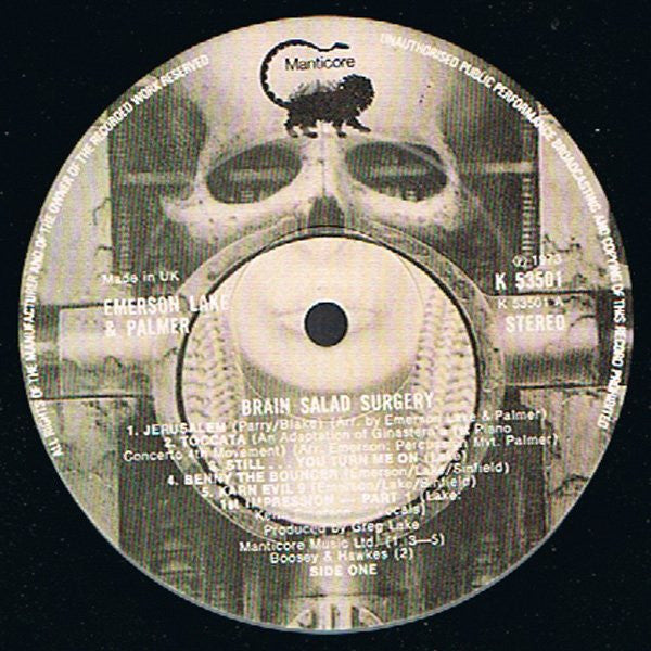 Image of Label Cover of LP - VG/VG+ - EMERSON, LAKE AND PALMER (ELP), Brain Salad Surgery (Manticore; K53501, UK 1973, Die Cut Sleeve, Poster, No 'A Warner Communications Co.' credit), Edge and Ring Wear,  - 4346025S