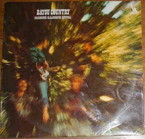 Image of Front Cover of LP - VG/G+ - CREEDENCE CLEARWATER REVIVAL, Bayou Country (Liberty Black With Blue/Yellow Labels; LBS 83261, UK 1970s Reissue, Laminated Sleeve), Light marks only, Laminate lift at sleeve spine,  - 3716375C