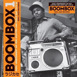 Image of Front Cover of 4614339C: 3xLP - VARIOUS ARTISTS, Soul Jazz Records Presents Boombox: Early Independent Hip Hop, Electro and Disco Rap 1979-82 (Soul Jazz; SJRLP334, UK 2016, Picture Sleeve, 3 Inners) Some marks to discs. Still in stickered shrink.  EX/VG