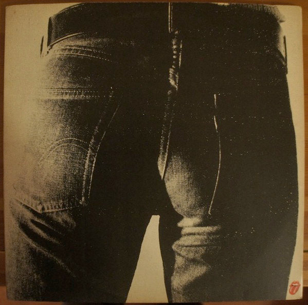 Image of Back Cover of LP - G+/G - THE ROLLING STONES, Sticky Fingers (Rolling Stones; COC59100, UK 1971, Small ALFA Engraved Zip Sleeve, Insert, No Promotone On Labels), Lots of light marks and hairlines, Functioning zip, Buckle mostly intact, Bottom edge of sleeve split. ,  - 1716624C