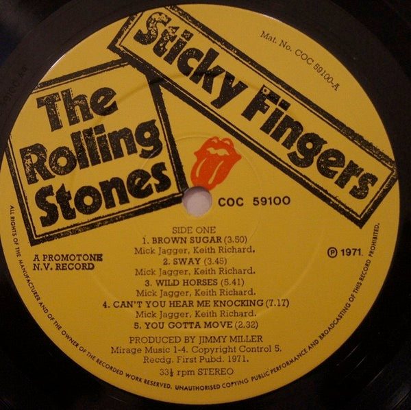 Image of Label Cover of LP - G+/G - THE ROLLING STONES, Sticky Fingers (Rolling Stones; COC59100, UK 1971, Small ALFA Engraved Zip Sleeve, Insert, No Promotone On Labels), Lots of light marks and hairlines, Functioning zip, Buckle mostly intact, Bottom edge of sleeve split. ,  - 1716624C