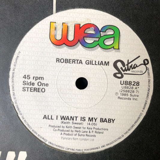 Image of Front Cover of 7" - G+/VG - ROBERTA GILLIAM, All I Want Is My Baby (WEA; U8828, UK 1985, Company Sleeve), Sleeve creased and scuffed. Writing on label in biro,  - 3416170C