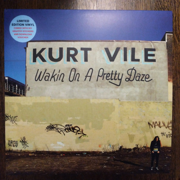 Image of Front Cover of 1724064E: 2xLP - KURT VILE, Wakin On A Pretty Daze  (Matador; OLE9980, UK 2013, Gatefold, 2 Inners & Insert, Sticker Sheet, Blue Vinyl.) No stickers. Inaudible mark on Side C and a few light hairlines.  VG+/VG