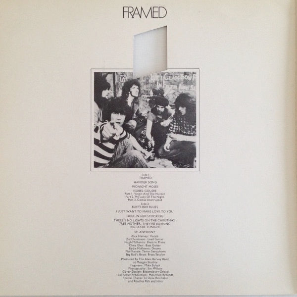 Image of Back Cover of 4645059S: LP - THE SENSATIONAL ALEX HARVEY BAND, Framed (Vertigo Spaceship; 6360081, UK 1973 Reissue, Gatefold Die Cut Slv, Misprint) Surface marks. Strong G+ sleeve, heavy edge wear, seam splitting to spine, ring wear, wear to die cut edges, creasing and staining/discolouration.  G+/VG