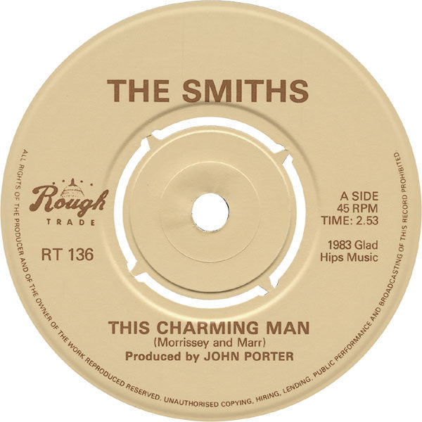 Image of Label Cover of 7" - VG/VG - THE SMITHS, This Charming Man / Jeane (Rough Trade; RT 136, UK 1983, Picture Sleeve, Push Out Centre. Rough Trade "Capitol" Logos), Rough Trade Sticker over Dome logo. Centre Intact,  - 4356019S