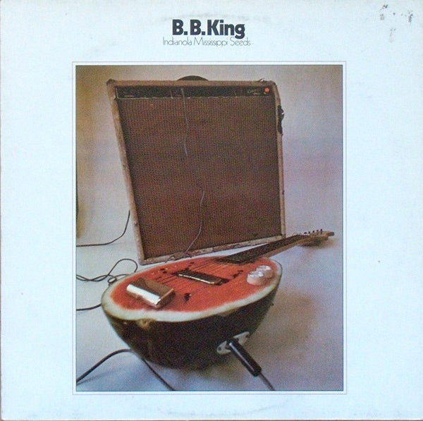 Image of Front Cover of LP - G+/G+ - B.B. KING, Indianola Mississippi Seeds (Castle Classics; CLALP 141, UK 1987 Reissue), Record has some areas of light fogging. Sleeve has liquid damage, rips and staining along bottom on either side. Staining elsewhere on sleeve, plus old ripped sticker on front,  - 3016261C