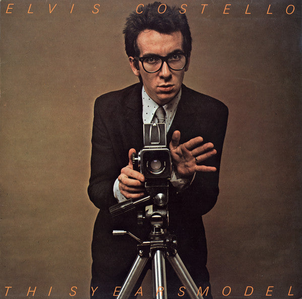 Image of Front Cover of LP - VG+/VG+ - ELVIS COSTELLO, This Year's Model (Imp Records; FIEND 18, UK 1984 Reissue, Inner & Advert Insert, Misprinted cover without deliberate error.), A couple of light hairlines.,  - 2526048E