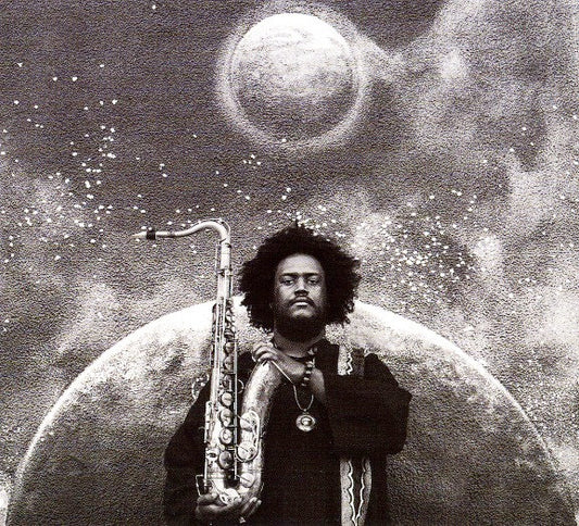 Image of Front Cover of 3xLP - NEW/NEW - KAMASI WASHINGTON, The Epic (Brainfeeder; BF050, US 2015, Box Set, Unusual Item - Please Enquire about Postage), , A brazen release from young Los Angeles jazz giant, composer and bandleader Kamasi Washington. 'The Epic' is unlike anything jazz has seen and not just because it emanates from the boundary-defying Brainfeeder. 'The Epic' is a 172 minute, three volume set (across three LPs) that includes a 32-piece orchestra, a 20-person choir and 17 songs overlaid with 