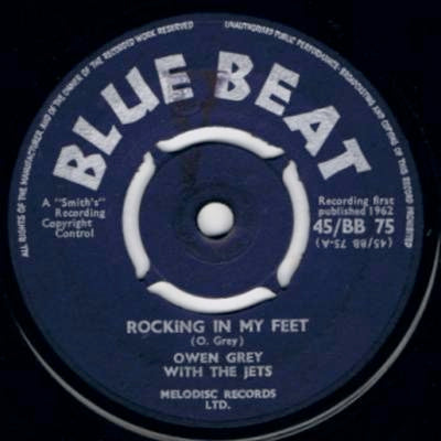 Image of Front Cover of 7" - VG/G+ - OWEN GRAY WITH THE JETS, Rocking In My Feet / Nobody Else (Blue Beat; 45/BB 75, UK 1962, Company Sleeve, 4-Prong centre), Centre intact, in company sleeve.,  - 1116109C