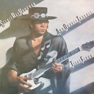 Image of Front Cover of 3425153E: LP - STEVIE RAY VAUGHAN AND DOUBLE TROUBLE, Texas Flood (Epic Light Blue and Yellow; EPC 25534, UK 1983) Strong VG+, Gold Promo Stamp On Rear Sleeve  VG+/VG+