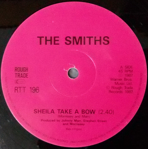 Image of Label Cover of 12" - VG+/VG+ - THE SMITHS, Sheila Take A Bow (Rough Trade; RTT 196, UK 1987, Picture Sleeve, Die-Cut Pink Inner, EMI Pressing), Strong VG+ Throughout,  - 2526194E