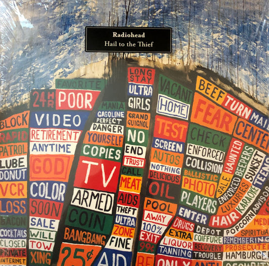 Image of Front Cover of 2xLP - NEW/NEW - RADIOHEAD, Hail To The Thief (XL Recordings; XLLP785, Europe 2022 Reissue, Gatefold, 2 Inners, 180 Gram Vinyl, Download Code), , Stunning sixth album from Oxford's finest sons. Moving slightly away from the heavy electronic influenced last two albums and back towards more intense numbers (a la 'OK Computer'). Angst filled love and hate songs. 'Hail To The Thief' is immersed in dread and paranoia, albeit a more visceral, emboldened dread and paranoia. This is one band