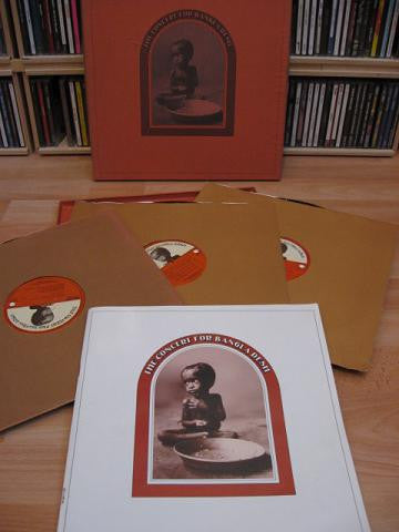 Image of Back Cover of 3xLP - VG+/VG+ - VARIOUS, The Concert for Bangladesh (Apple; STCX3385, UK 1972 Reissue, Box Set, Booklet, 3 Brown Inners, Auto-Coupled. Harrisongs Publishing Side One.), Clean copy, Small corner bump to box and one pen mark to rear, Otherwise nicely intact and still bright orange. Clean glossy discs and crisp booklet ,  - 4815084C