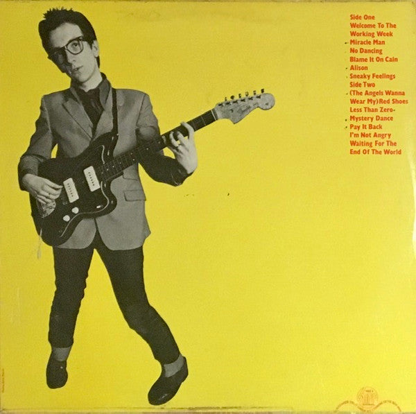 Image of Back Cover of LP - VG/VG+ - ELVIS COSTELLO, My Aim Is True (Stiff; SEEZ 3, UK 1977, Non-Laminated, Yellow Back Cover), Mild fading along spine. ,  - 2426228E