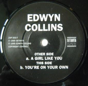 Image of Label Cover of 7" - VG/VG - EDWYN COLLINS, A Girl Like You (Setanta; ZOP 003-7, UK 1995 Reissue, Stickered Picture Sleeve), Sleeve has two light patches of sticker damage, plus light ring wear & a corner crease.,  - 4216035C