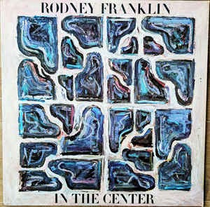 Image of Front Cover of 4914337C: LP - RODNEY FRANKLIN, In The Center (Columbia; JC-35558, Columbia    JC 35558, US 1978) Sleeve worn and creased with split top seam and some damage at spine. Stains and scuffs too  G+/G+