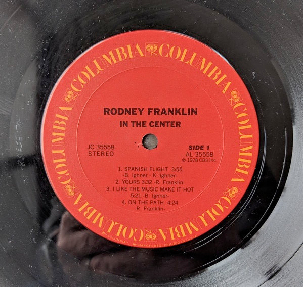 Image of Label Cover of 4914337C: LP - RODNEY FRANKLIN, In The Center (Columbia; JC-35558, Columbia    JC 35558, US 1978) Sleeve worn and creased with split top seam and some damage at spine. Stains and scuffs too  G+/G+