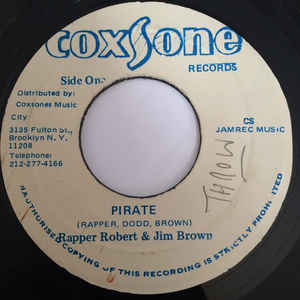 Image of Front Cover of 4614316C: 7" - RAPPER ROBERT & JIM BROWN, Pirate / Them A Pirate (Coxsone Records; , Jamaica 1983) Pressing flaws on record. Label worn and a bit damaged with sticker on it that says "SIMON BLASSE"  /G+